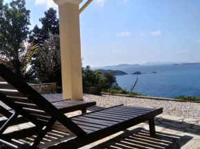 Отель Holiday house with stunning views nearby the cozy village Afionas  Афион